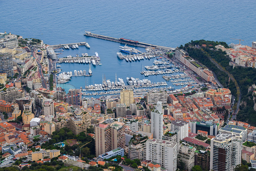 Monte Carlo, Monaco - November 8 2019: Daytime aerial panoramic view of La Condamine and Port Hercules.