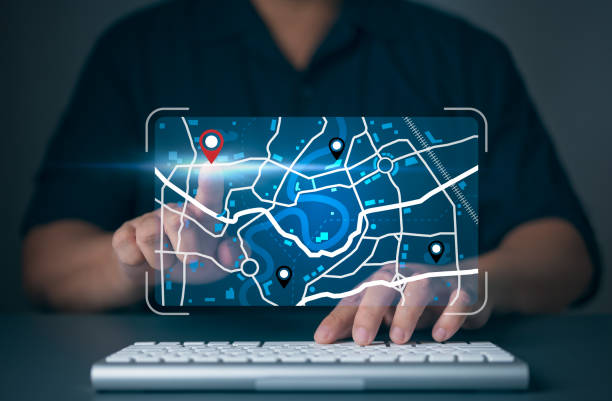 istock Businessman use computer keyboard to search for address on world map with location pin points. Marking destination for travel or finding business places in GPS Satellite coordinates system online web. 1720651373