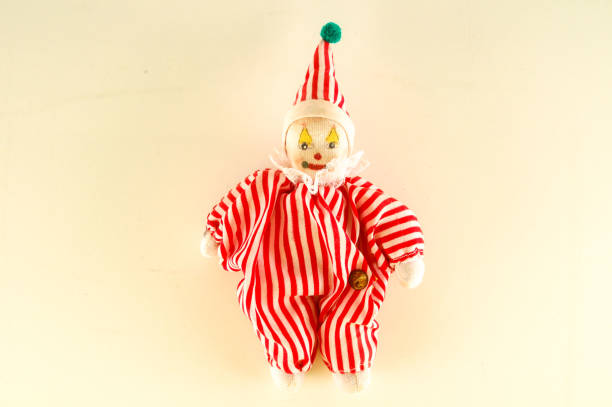 istock Pierrot toy doll on white background 1720653022