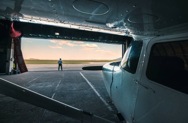 istock the plane in the hangar 1720685548