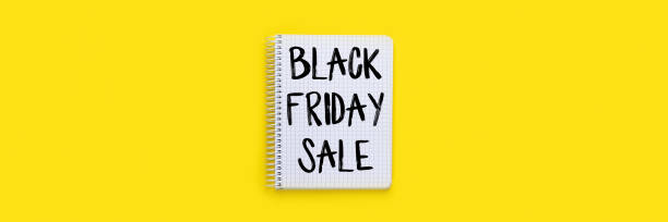 istock Black Friday Sale sign on notebook banner 1720723272