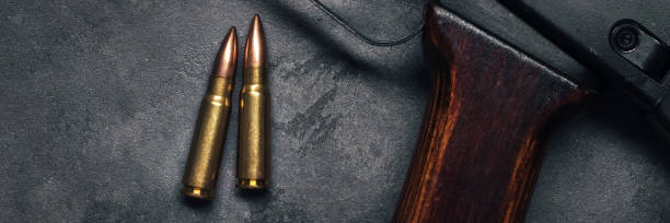 istock Bullets for Kalashnikov assault rifle banner 1720723865