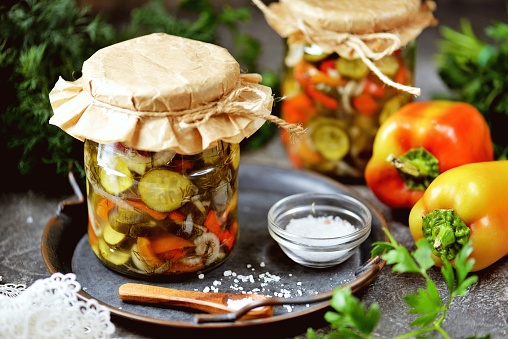 Pickled cucumber salad with bell pepper and onion