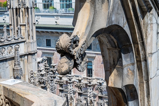MIlan, Italy – June 18, 2023: Closeup of the artwork on the columns of the Milan Cathedral.
