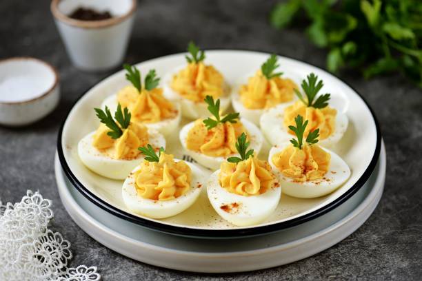 istock Stuffed chicken eggs, healthy snack on the festive table 1720762711
