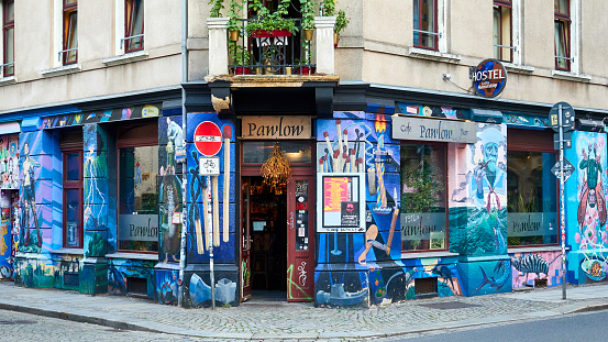 Dresden, Germany - September, 23rd - 2023: Graffiti at the café bar Pawlow in Dresden-Neustadt.