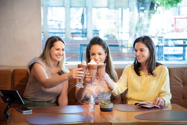 istock Three friends toasted with milk shake 1720773613