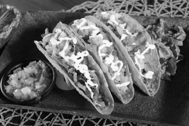 mexican tacos with corn tortillas guacamole sala jalapeno typical tex mex food