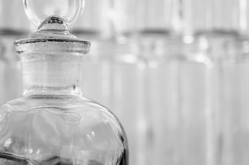 Vintahe reagent bottle and other glassware in black and white