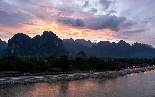 View of the mountains and Mekong River at sunset in Vang Vieng, Laos