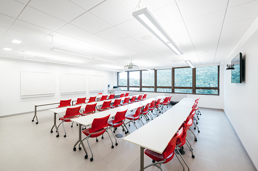 Wide angle photo of empty university classroom