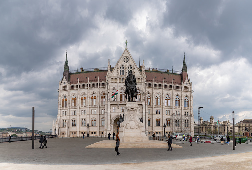 Budapest, Hungary - April 24, 2023: A picture of the Hungarian Parliament Building and the Statue of Count Gyula Andrassy.