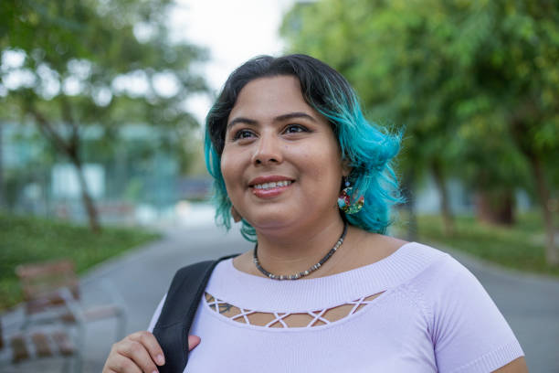 istock Young plus-size woman in the city 1720874423