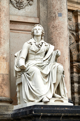 Dresden, Germany - September, 24th - 2023: Friedrich Schiller Statue sthe Semper opera house