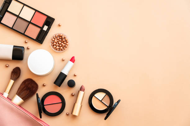 istock Make-up beauty products at pastel background. 1720904917