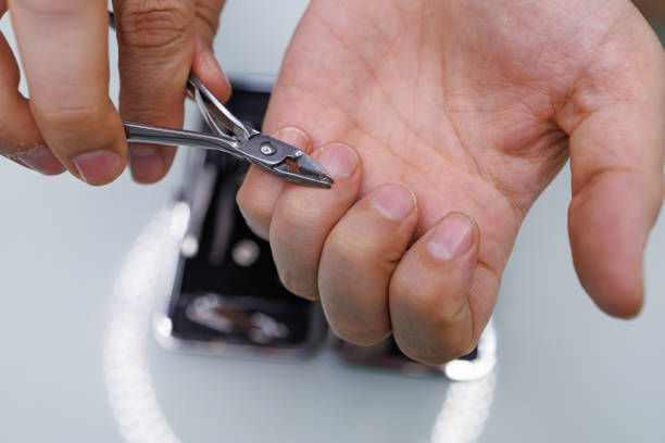 istock A man gives himself a manicure 1720909893