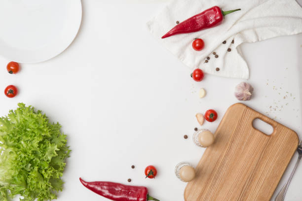istock Wooden board, with elements of food and kitchen utensils 1720913938