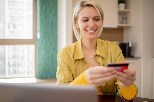 istock Young woman is shopping online 1720935934