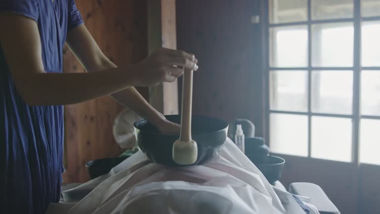 Japanese therapist's bowls work their magic, bringing a sense of peace to the client