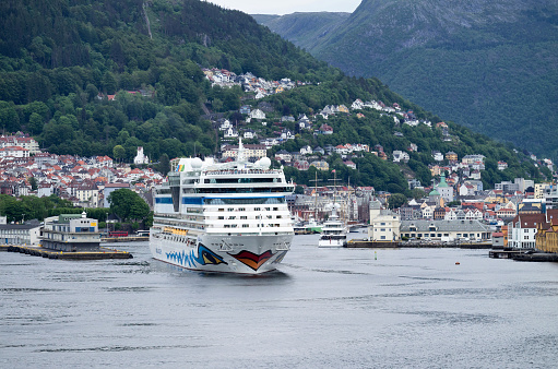 Bergen, Norway - June 6, 2017: cruise ship AIDAluna leaving Bergen