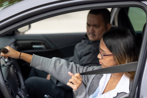 istock Father Teaching Daughter to Drive 1721032502