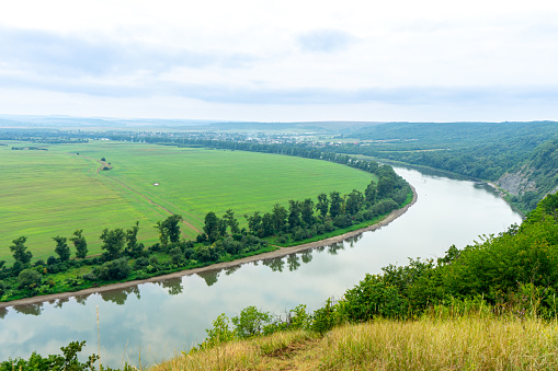 Landscape with canyon, forest and a river in front, Ukraine
