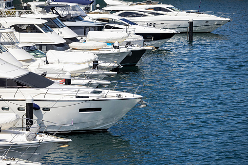Motorboats at marina, background with copy space, full frame horizontal composition
