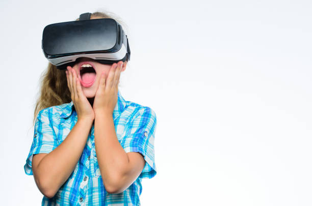istock Small kid use modern technology virtual reality. Virtual education for school pupil. Get virtual experience. Virtual reality concept. Girl cute child with head mounted display on white background 1721088785