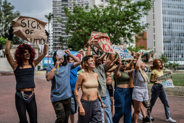 istock Environmentalists protesting at city street 1721094882