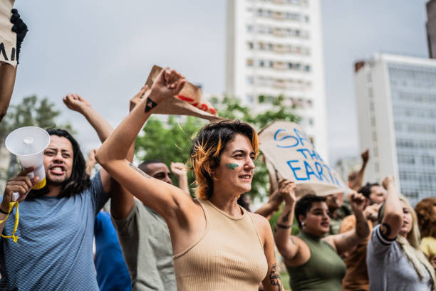 istock People during a protest at city street 1721094888
