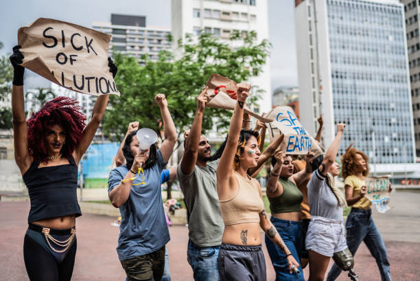 istock Environmentalists protesting at city street 1721094891