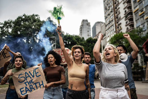istock Environmentalists protesting at city street 1721094910