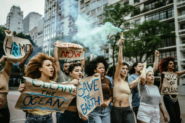 istock Environmentalists protesting at city street 1721094920