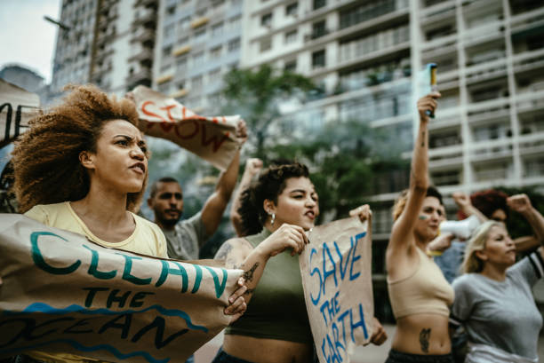 istock Environmentalists protesting at city street 1721094923