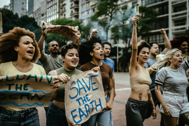 istock Environmentalists protesting at city street 1721094929