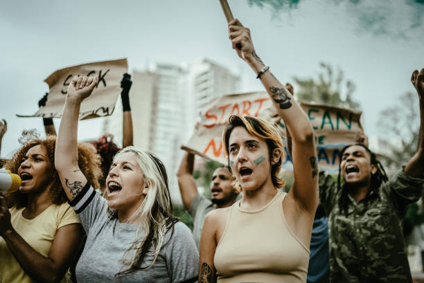 istock People during a protest at city street 1721094941