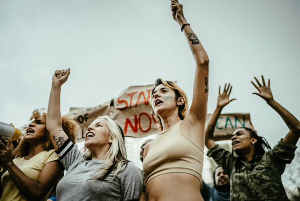 istock People during a protest at city street 1721095164