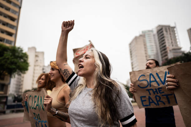 istock Environmentalists protesting at city street 1721095452