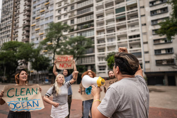 istock Environmentalists protesting at city street 1721095467