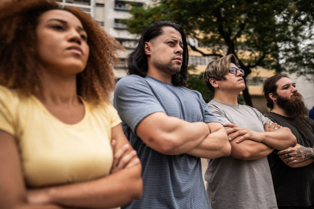 istock People with arms crossed during a protest outdoors 1721095484