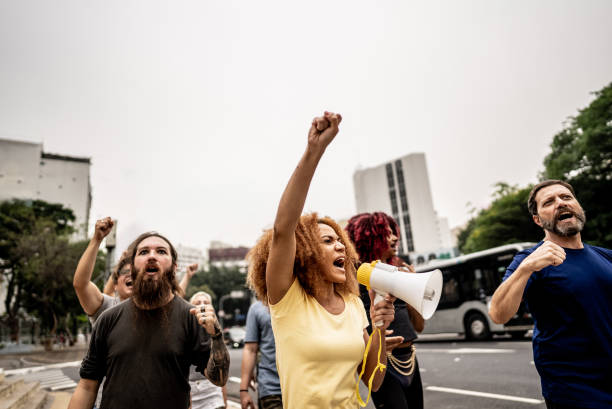 istock People protesting in the street 1721104223