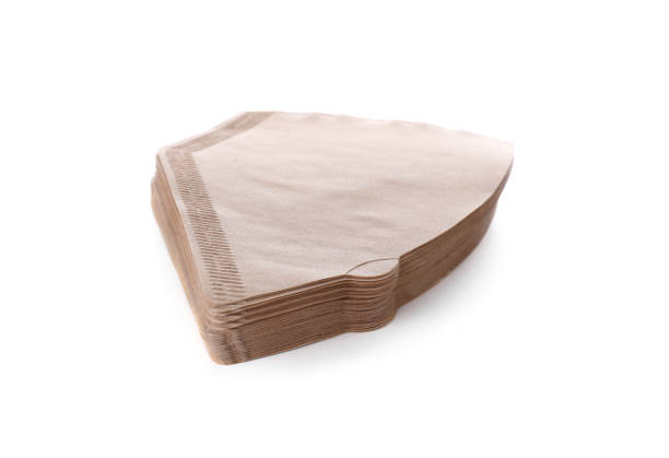 istock Stack of paper coffee filters isolated on white 1721119329