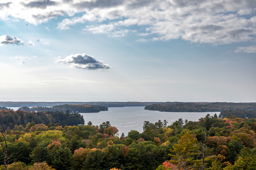 Huckleberry Rock Lookout offers a view on the north side of Lake Muskoka, looking out over the many islands and the Autumn coloured leaves.