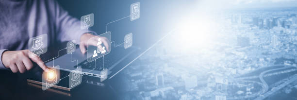istock Communication and Contact us or Customer support hotline people connect. Hand using a laptop and touching on virtual screen contact icons, email and address, live chat with internet wifi. 1721130046