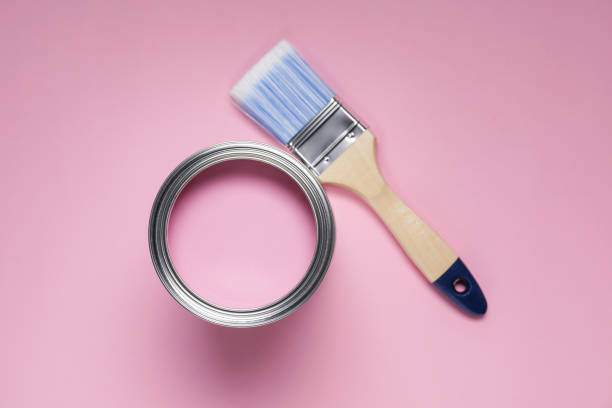 istock Can with paint and brush on pink background, flat lay 1721174144