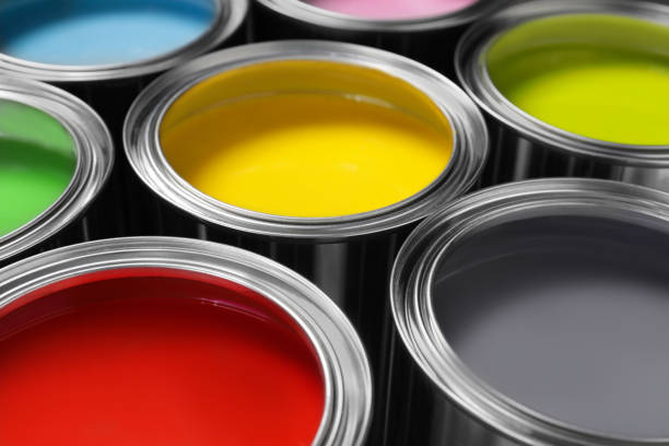istock Open cans of different paints as background, closeup 1721175836