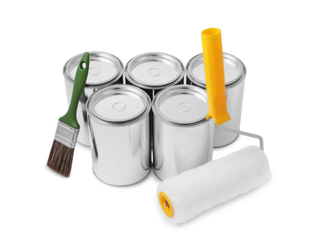 istock Cans of paints, brush and roller on white background 1721176959