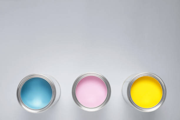 istock Cans with colorful paints on light background, flat lay. Space for text 1721176962