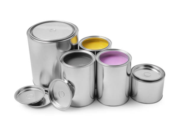 istock Cans of yellow, lilac and grey paints on white background 1721176975