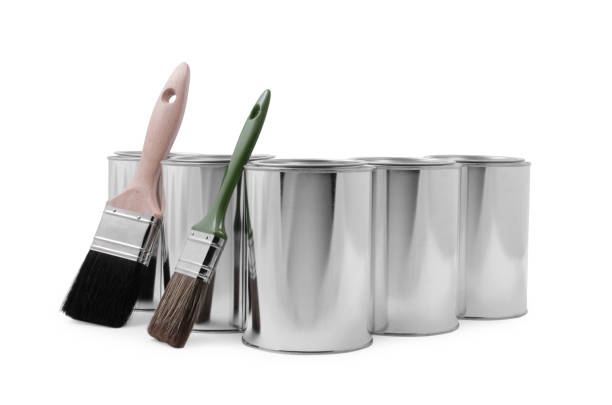 istock Cans of paints and brushes on white background 1721177273
